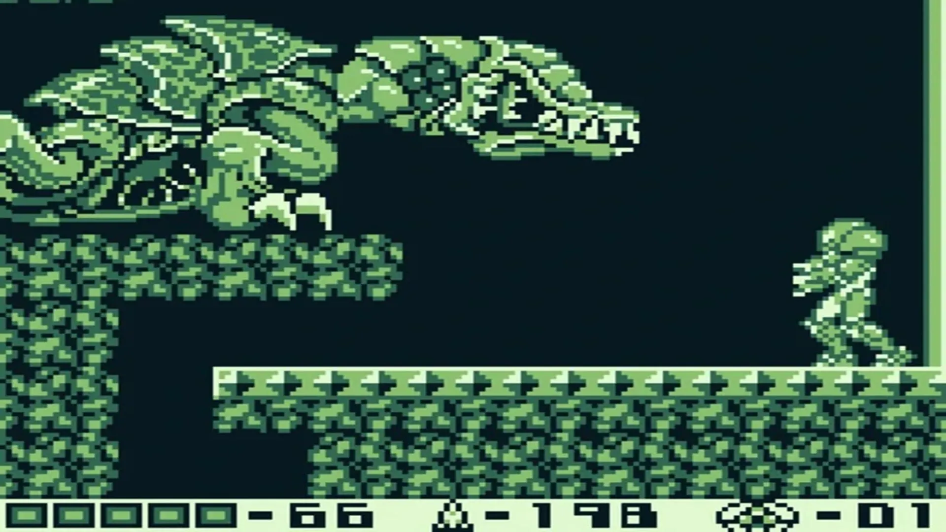 Ảnh màn hình game Metroid II: Return of Samus trên Game Boy với đồ họa đơn sắc đặc trưng