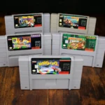 Các băng game SNES (Super Nintendo Entertainment System) xếp chồng, biểu tượng của quyền sở hữu game vật lý thời xưa
