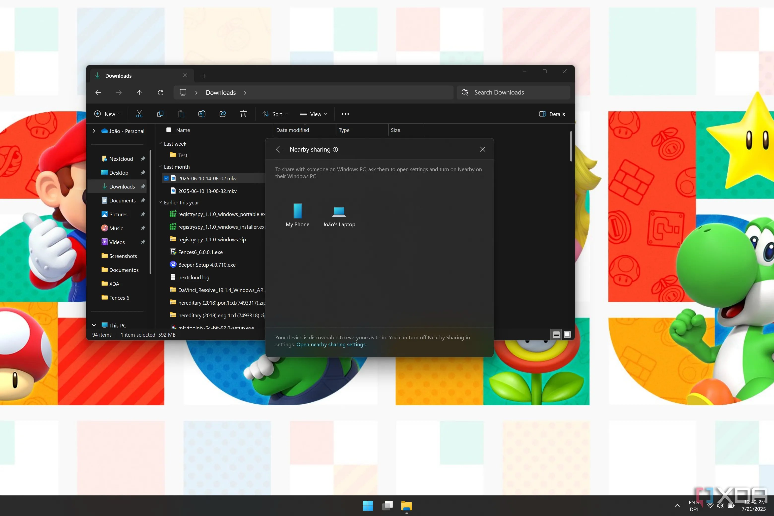 File Explorer trên Windows 11 với menu chia sẻ hiển thị các tùy chọn chia sẻ lân cận