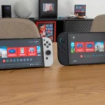 Hình ảnh so sánh máy chơi game Nintendo Switch OLED và Nintendo Switch 2, minh họa các thế hệ console có liên quan đến lỗi 'Squid Roll' trong Splatoon 3