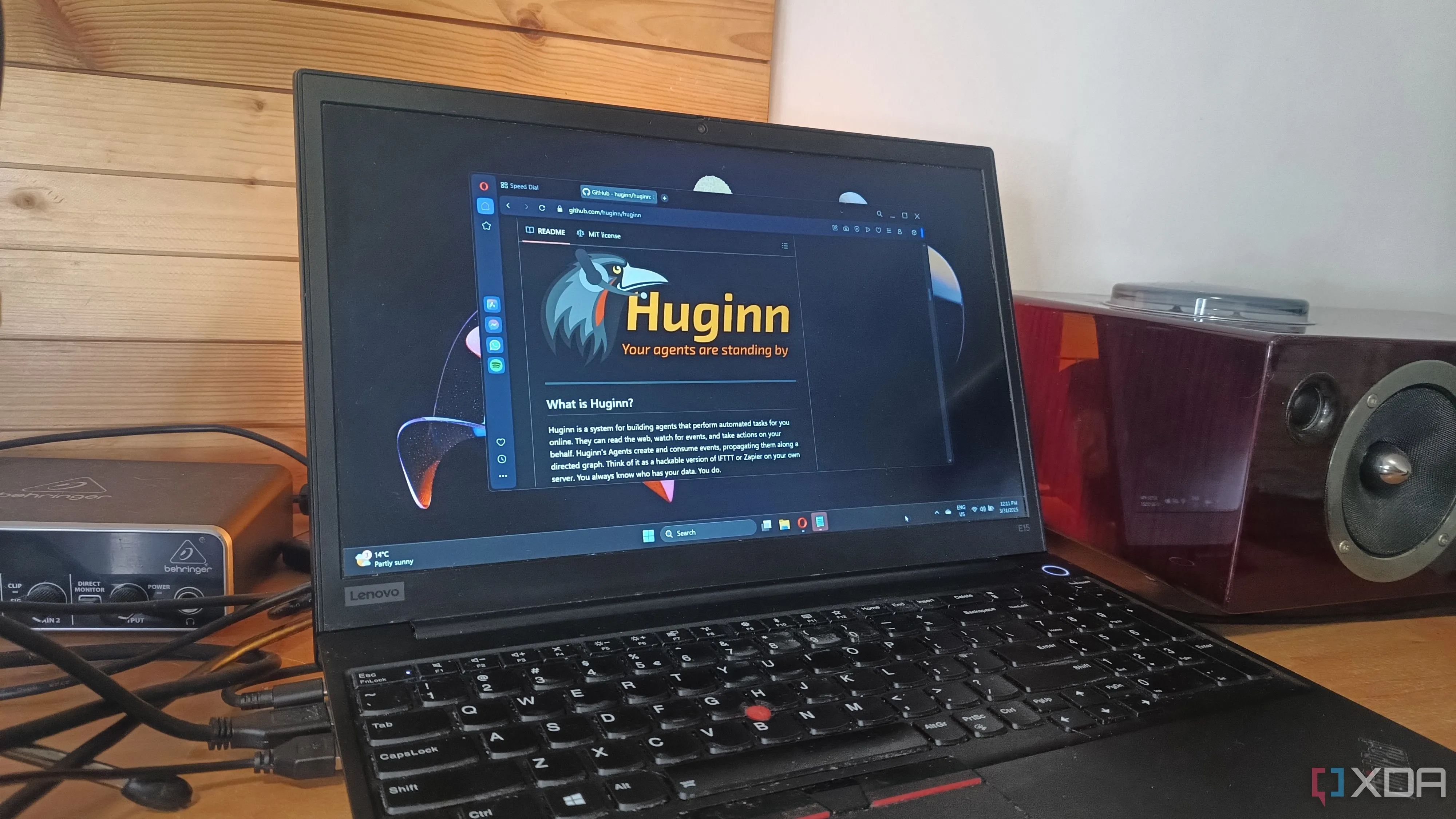 Màn hình laptop hiển thị trang GitHub của Huginn, minh họa ứng dụng tự động hóa phức tạp