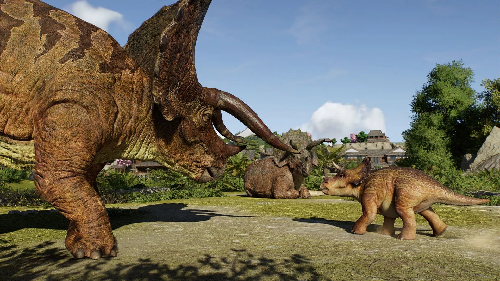 Một chú Velociraptor đang săn mồi trong chuồng, thể hiện cơ chế sinh tồn của các loài khủng long ăn thịt trong Jurassic World Evolution 3.