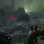 Mũi tên chỉ lối vào khu vực bí mật đầu tiên trong Chapter 16 Doom The Dark Ages