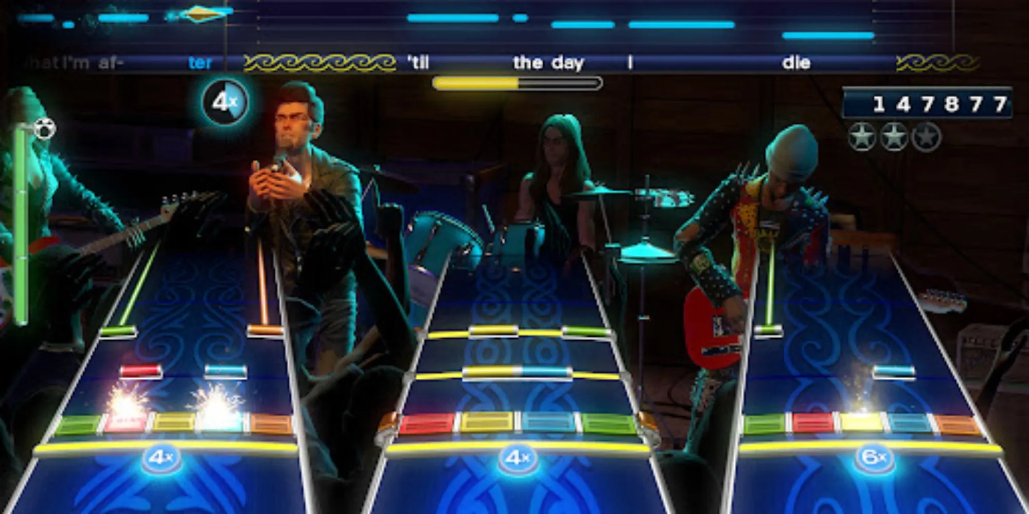 Người chơi cùng ban nhạc thể hiện ca khúc trong game Rock Band 4 trên Xbox One