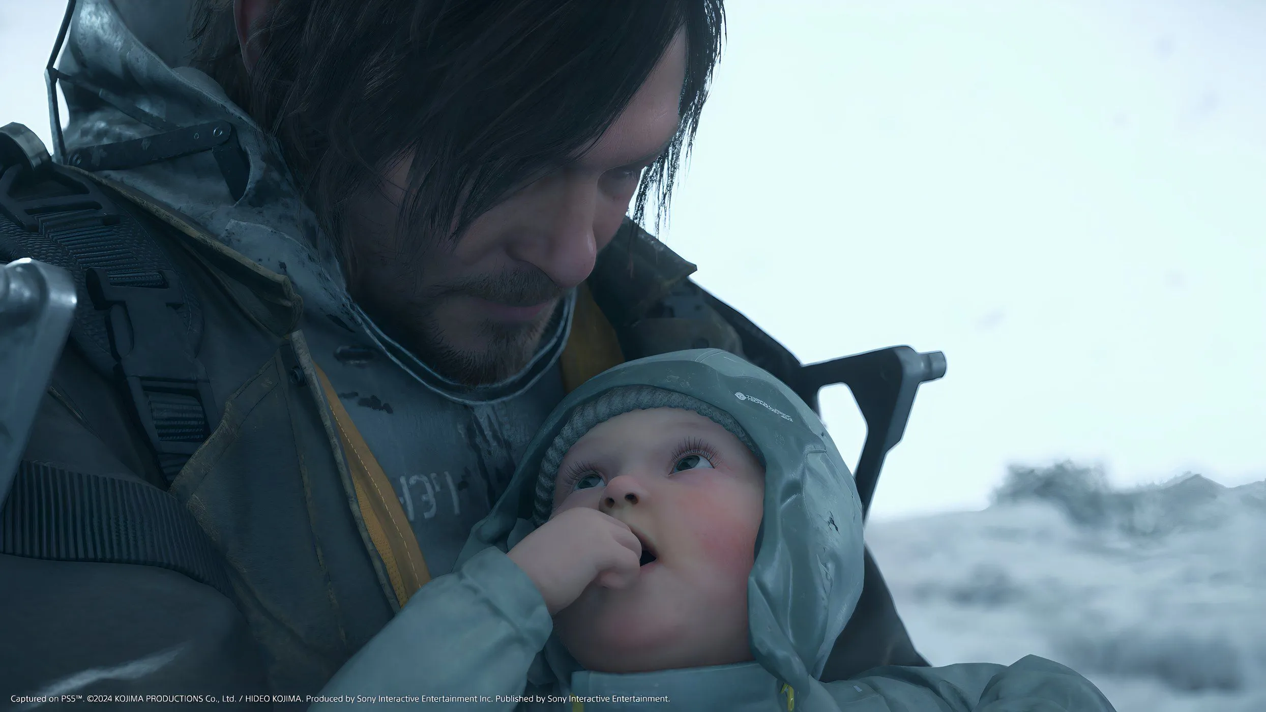 Nhân vật Sam Porter Bridges và em bé BB trong khung cảnh đậm chất Death Stranding 2: On The Beach