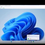 Tính năng Cross Device Resume của Windows 11 trên thanh tác vụ với biểu tượng Spotify và điện thoại